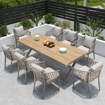 Скандинавските маси и столове за отдих в двора, водоустойчив слънцезащитен пластмаса, дървена маса, градина, ратан от алуминиева сплав